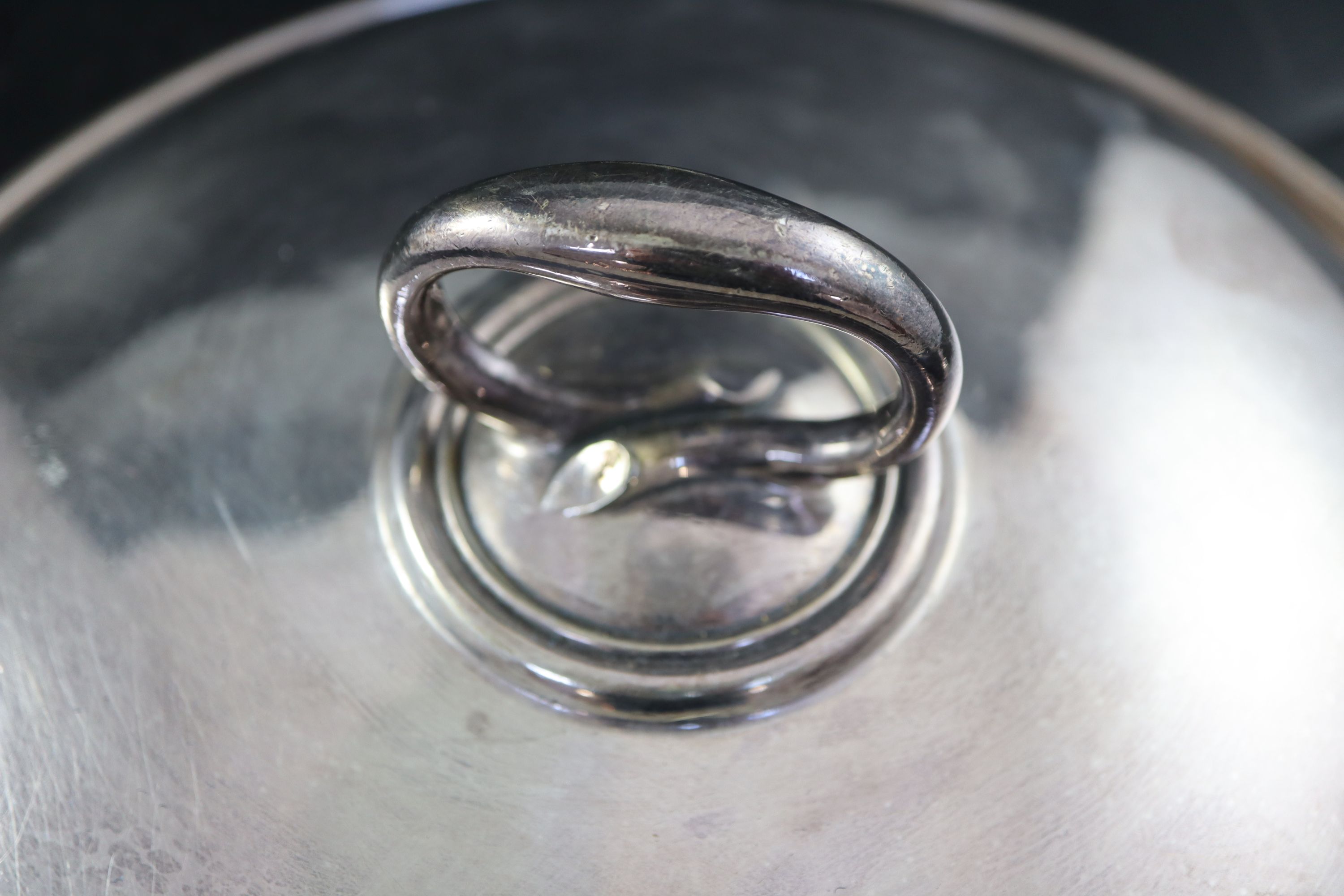 An Elkington & Co circular three division plated vegetable dish and cover, diameter 25.5cm
